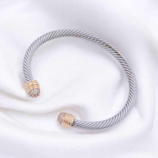 BrazaleteAbiertoPlateadoconDetalleTrenzadoyZirconias