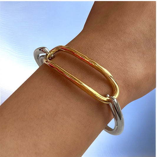 Pulsera Bicolor de Stainless steel con Eslabón Ovalado Dorado – Elegancia Minimalista