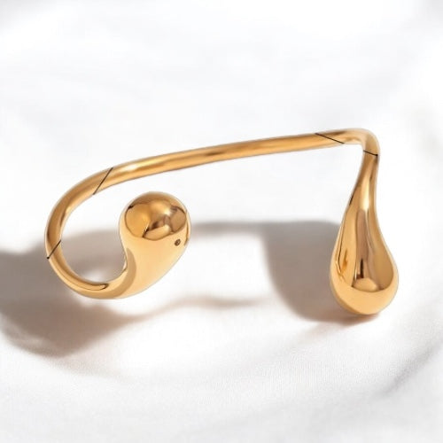 P008_Pulsera_Abierta_Dorada_con_Detalle_de_Gotas