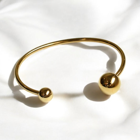 Pulsera Ajustable Dorada o Plateada con Esferas Pulidas en Stainless Steel