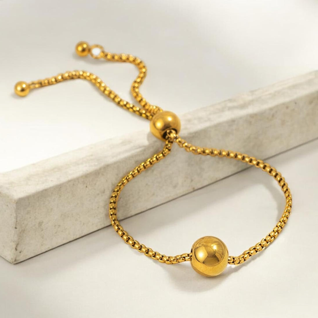 Pulsera_Ajustable_Dorada_con_Esfera